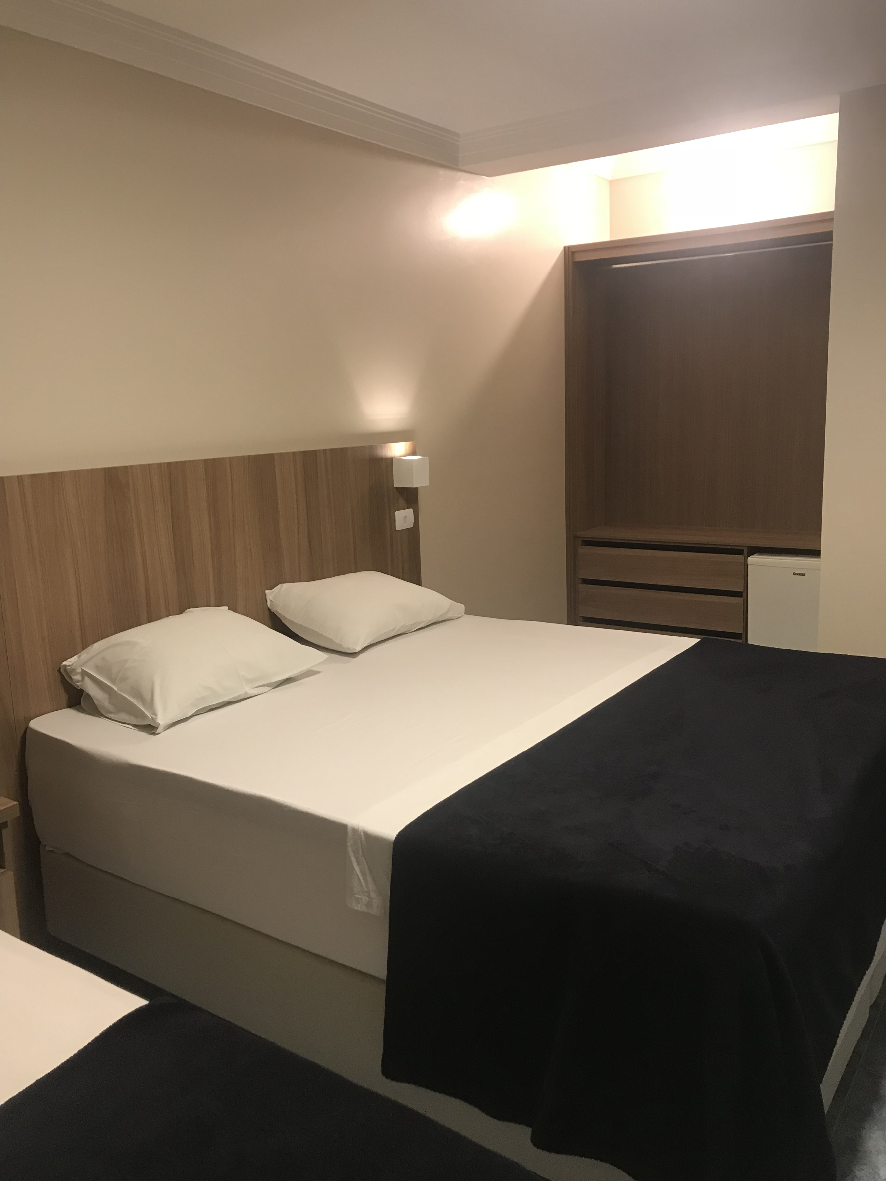 Cama em acomodação do Hotel Diamante
